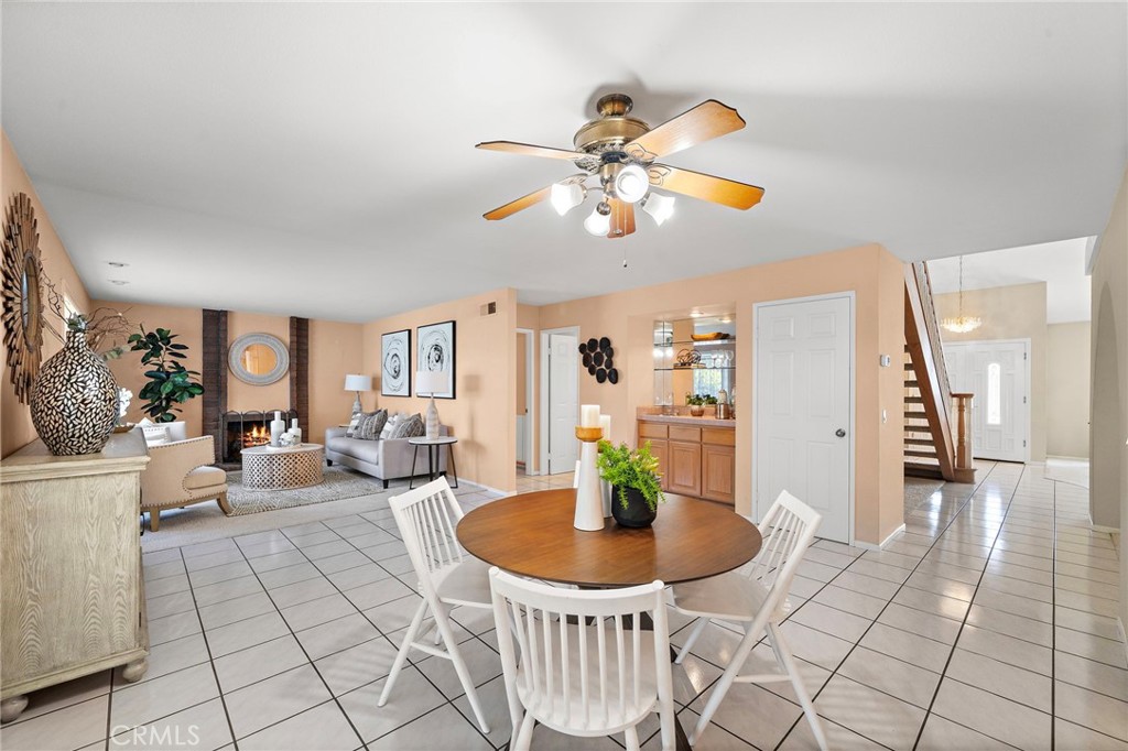 Casual dining space connects naturally to the kitchen and family room. - 9115 McBride River Avenue, Fountain Valley CA 92708 - photo 14