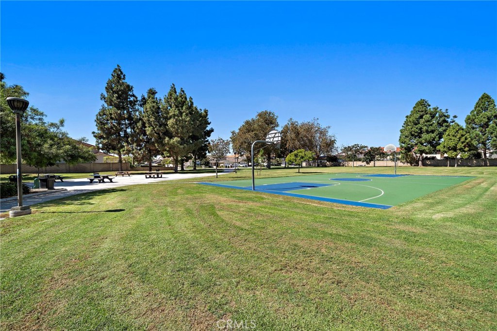 Open park lawn and outdoor recreation court. - 9115 McBride River Avenue, Fountain Valley CA 92708 - photo 51