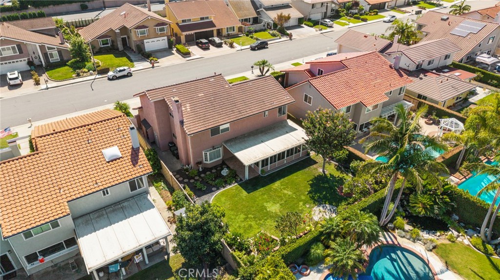 Angled aerial view of the home and backyard. - 9115 McBride River Avenue, Fountain Valley CA 92708 - photo 64