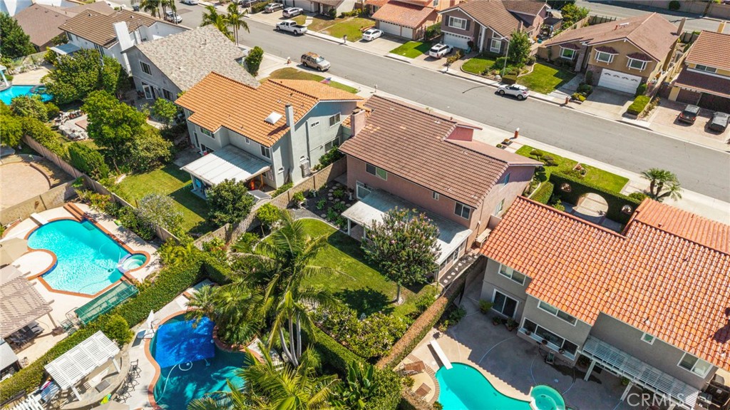 Elevated rear-side view of the property and neighboring homes. - 9115 McBride River Avenue, Fountain Valley CA 92708 - photo 66