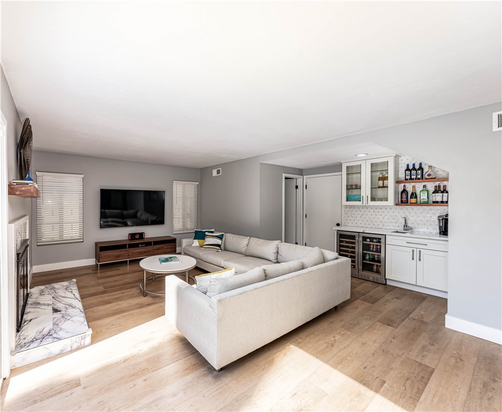 Spacious and inviting space that opens up to the backyard and pool - 9604 Newfame, Fountain Valley CA 92708 - photo 7