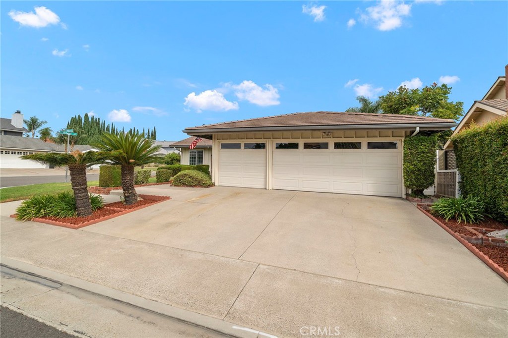 This beautifully maintained single-story home offers a rare combination of a 3-car garage - 9735 Hibiscus Avenue, Fountain Valley CA 92708 - photo 2