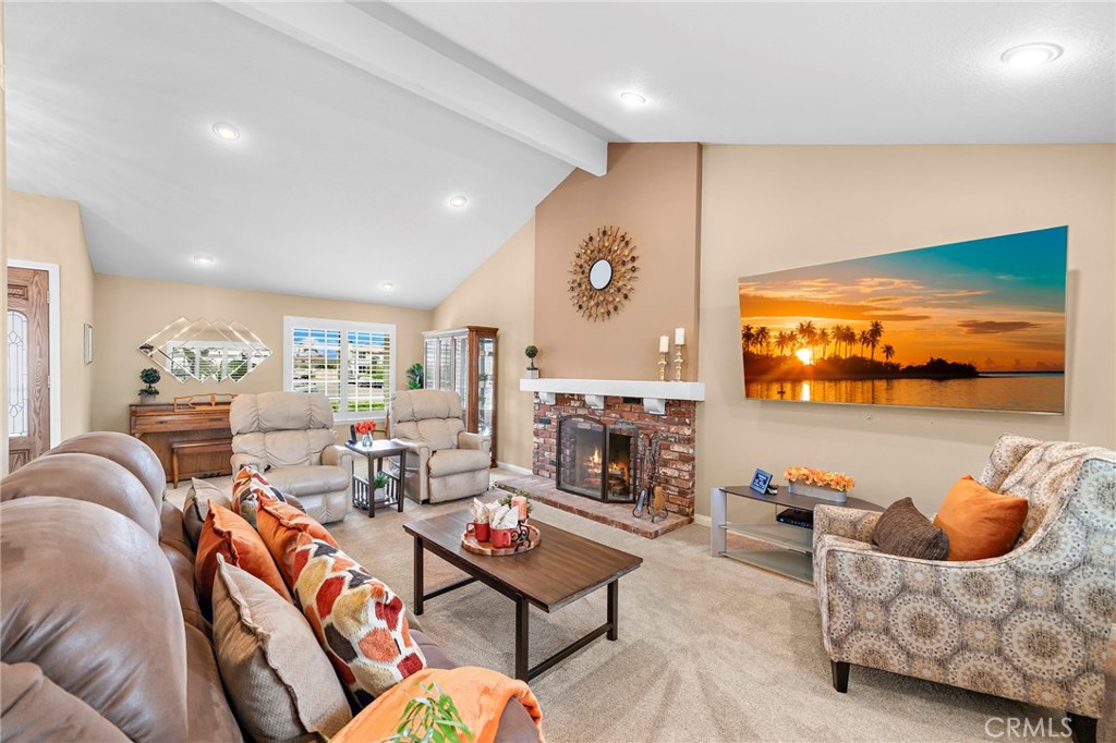 brick fire place in the living room - 9735 Hibiscus Avenue, Fountain Valley CA 92708 - photo 5