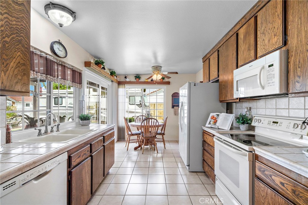 plenty of natural light comes into the kitchen - 9735 Hibiscus Avenue, Fountain Valley CA 92708 - photo 10