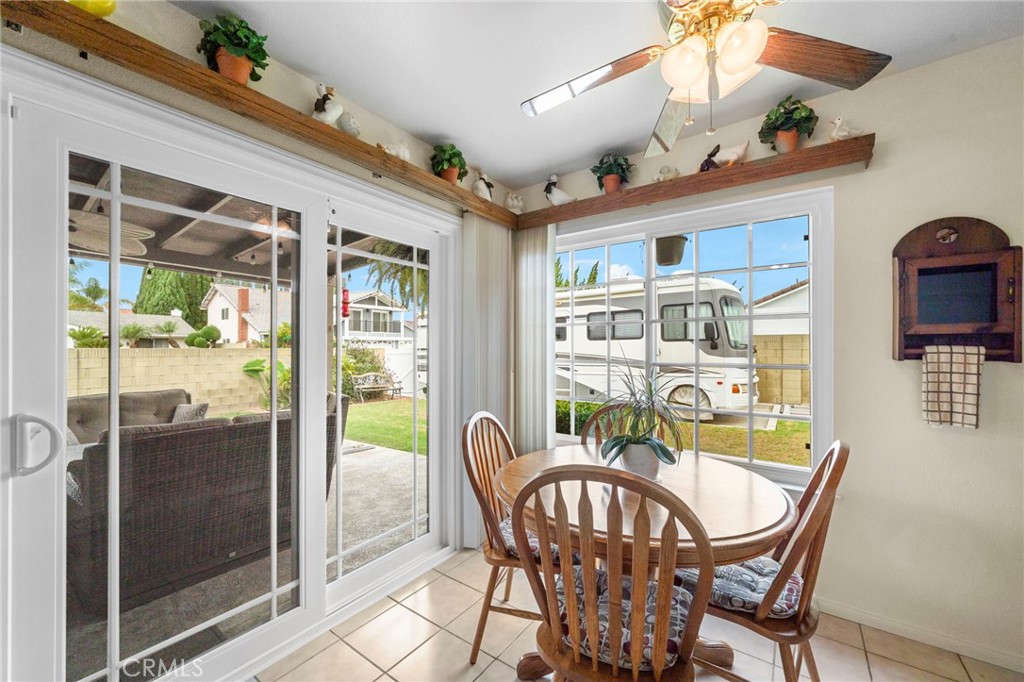 breakfast nook with ceiling fan - 9735 Hibiscus Avenue, Fountain Valley CA 92708 - photo 14