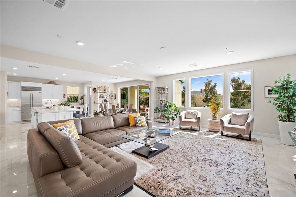 Great Room incorporates the Living Room, Dining Room, and Gourmet Kitchen - 9896 Heron Avenue, Fountain Valley CA 92708 - photo 5