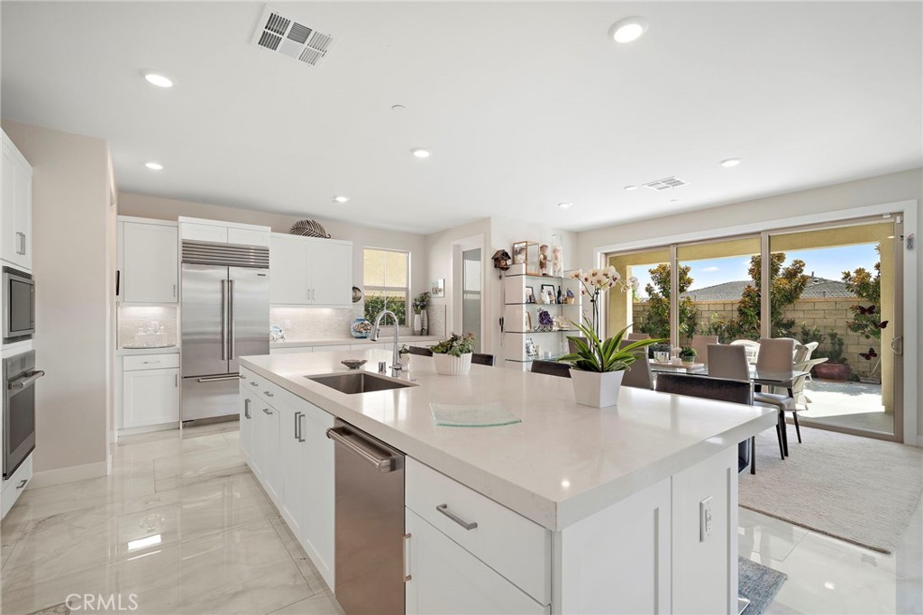 Kitchen with Walk-in Pantry - 9896 Heron Avenue, Fountain Valley CA 92708 - photo 13