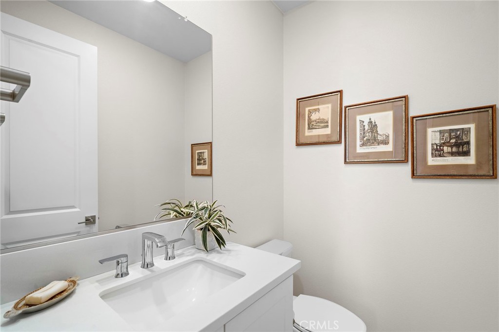 Downstairs guest 1/2 bathroom - 9896 Heron Avenue, Fountain Valley CA 92708 - photo 17