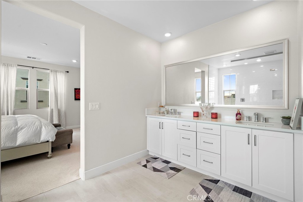 Primary Suite Bathroom with Dual Sinks - 9896 Heron Avenue, Fountain Valley CA 92708 - photo 23