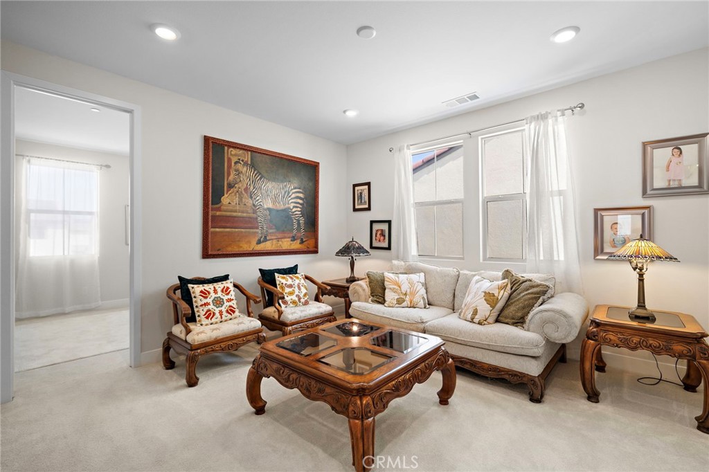 Upstairs loft/family room - 9896 Heron Avenue, Fountain Valley CA 92708 - photo 25