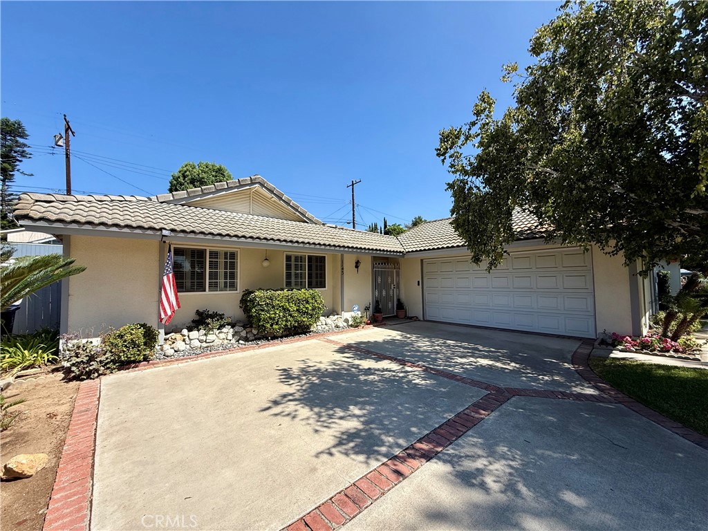 Plenty of driveway space for a RV, or multiple cars. Great curb appeal - 1143 Norby, Fullerton CA 92833 - photo 1