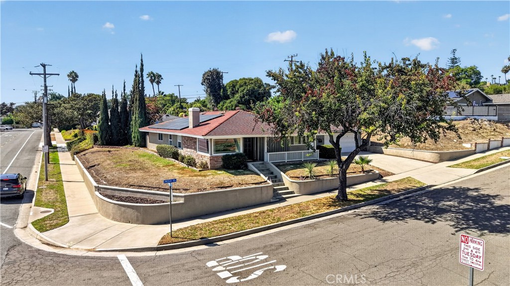 Front exterior and corner setting. - 1201 N Lincoln Avenue, Fullerton CA 92831 - photo 1