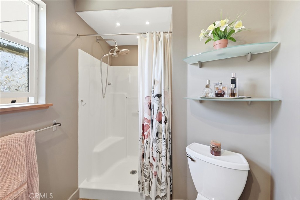 Another angle of the updated guest bathroom with modern upgrades and stylish finishes. - 1201 W Valencia Drive 13, Fullerton CA 92833 - photo 19