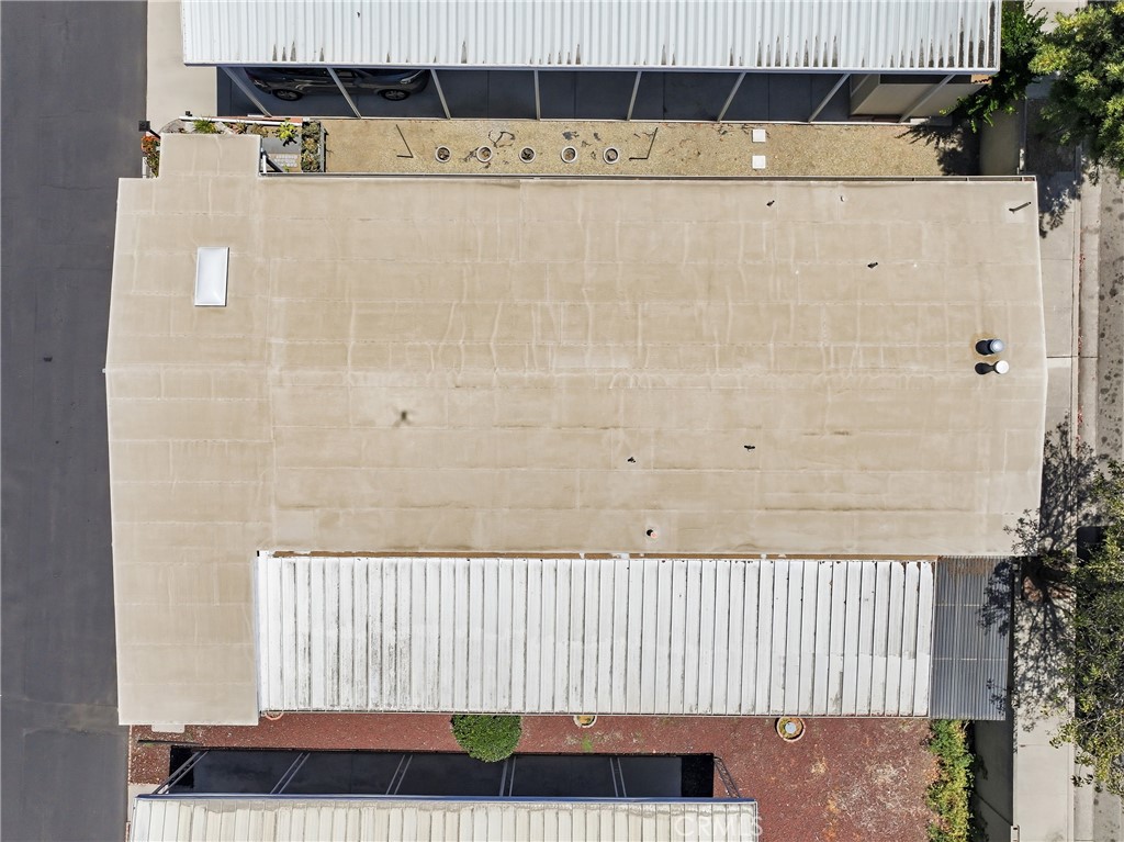 The roof was recently resealed with a silicone coating for added protection and longevity - 1201 W Valencia Drive 13, Fullerton CA 92833 - photo 27