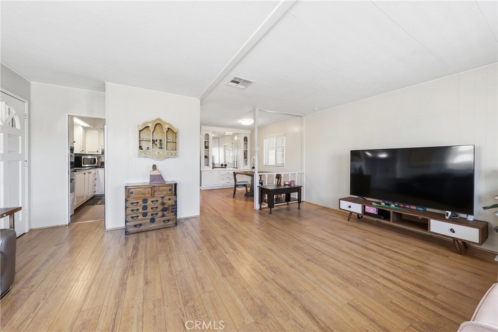There is a ring camera indoors. Please note once entering the property audio and video may be in progress. - 1201 W Valencia Drive 69, Fullerton CA 92833 - photo 4