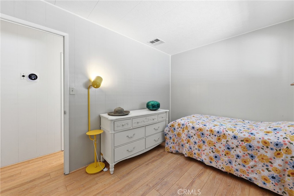 A nicely sized guest bedroom. - 1201 W Valencia Drive 69, Fullerton CA 92833 - photo 12