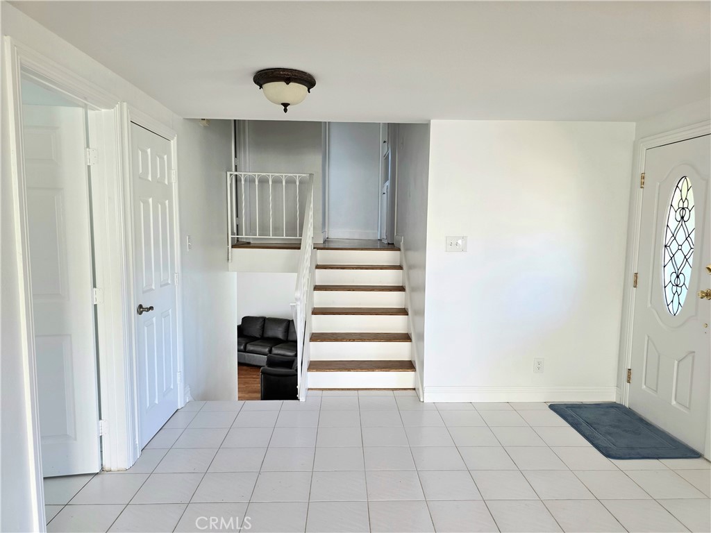 Stairs down to Bonus Room, Stairs up to Bedrooms - 1640 Canyon Drive, Fullerton CA 92833 - photo 9
