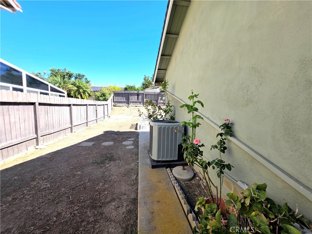 Side of the home​​‌​​​​‌​​‌‌​​‌‌​​‌‌​​‌​​​‌‌​‌​​​​‌‌​‌​​ Backyard - 1640 Canyon Drive, Fullerton CA 92833 - photo 17