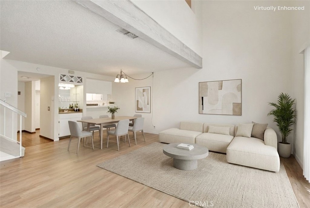 Virtually staged photo of dining and living room area - 1680 Shady Brook, Fullerton CA 92831 - photo 1