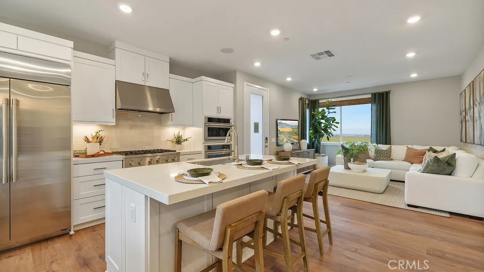 Photos shown are of model only- not actual homesite. - 1723 Lychee Street, Fullerton CA 92835 - photo 1