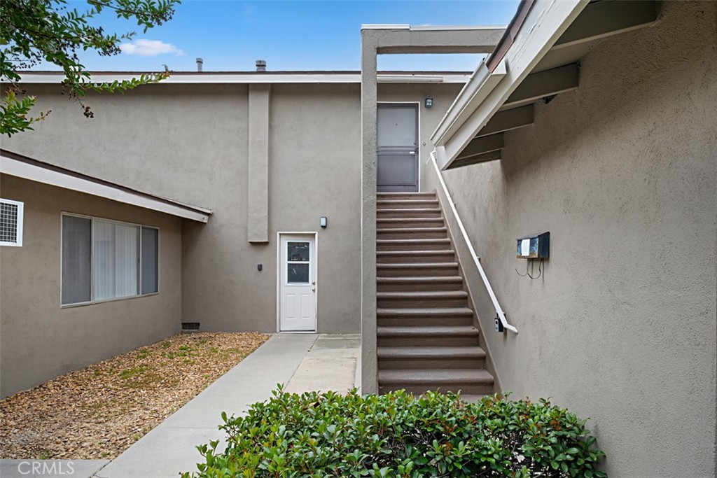 Unit is fully upstairs, minimal shared wall with neighbor downstairs - 2030 E Wilshire Avenue D, Fullerton CA 92831 - photo 1