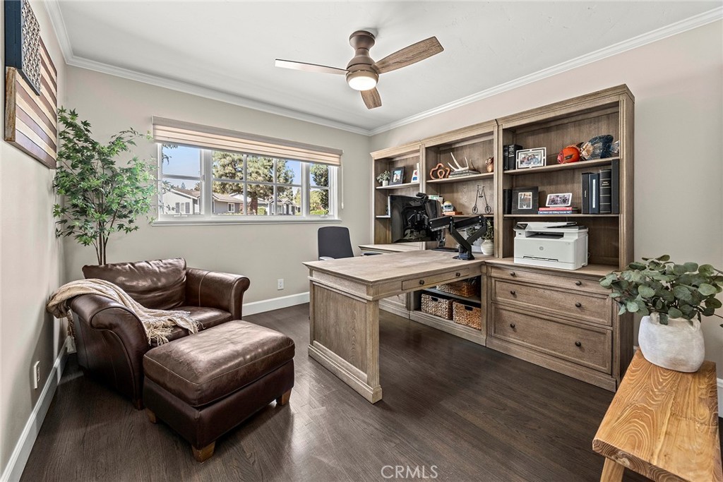 A spacious fourth bedroom currently serves as a beautifully appointed home office, offering abundant natural light and f - 2100 Yucca Avenue, Fullerton CA 92835 - photo 22