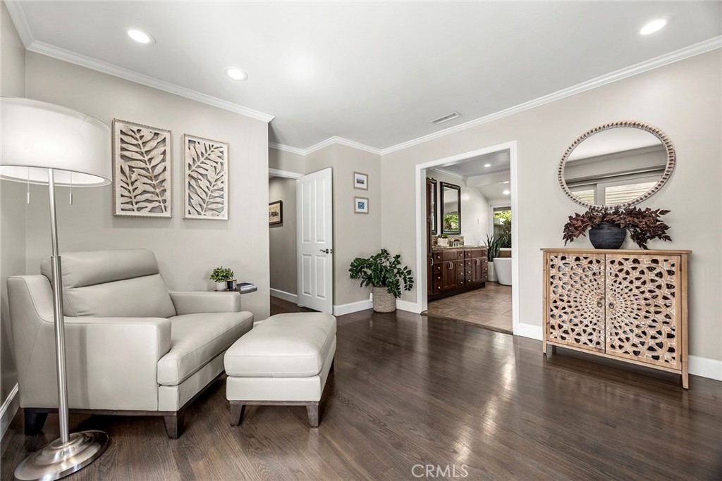 Charming light-filled sitting nook creates a quiet retreat with direct access to the covered patio and backyard. - 2100 Yucca Avenue, Fullerton CA 92835 - photo 24