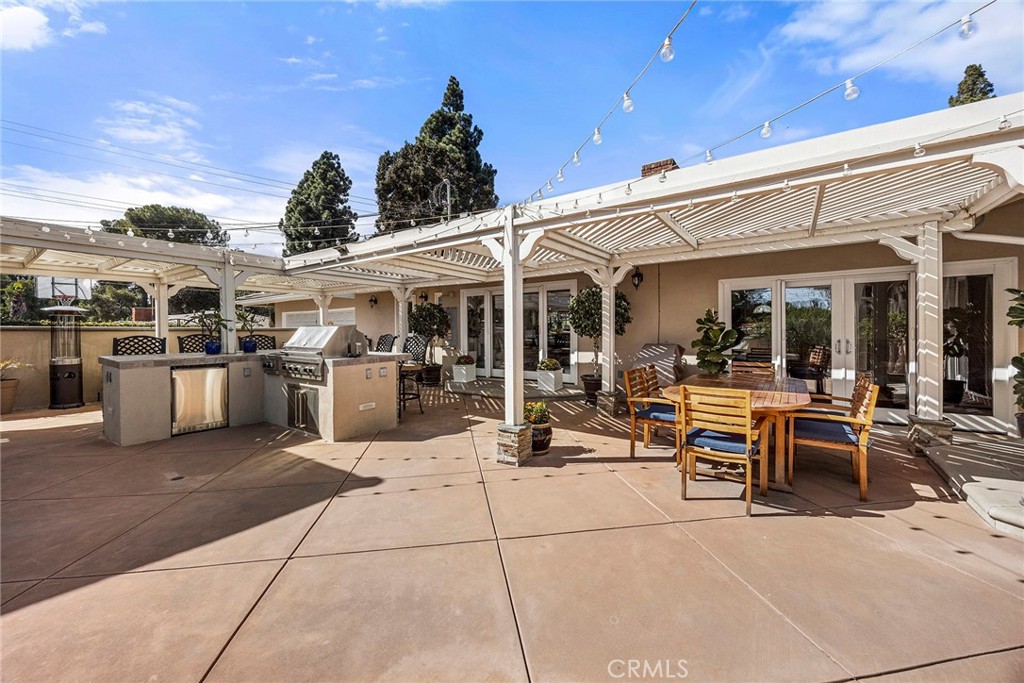 Expansive covered patio and outdoor kitchen offer exceptional space for dining, entertaining and enjoying Southern Calif - 2100 Yucca Avenue, Fullerton CA 92835 - photo 44