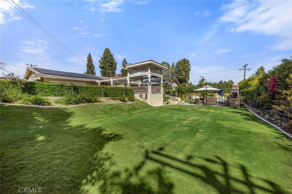 Generous lawn offers an exceptional amount of usable outdoor space for recreation, entertaining and play. - 2100 Yucca Avenue, Fullerton CA 92835 - photo 48