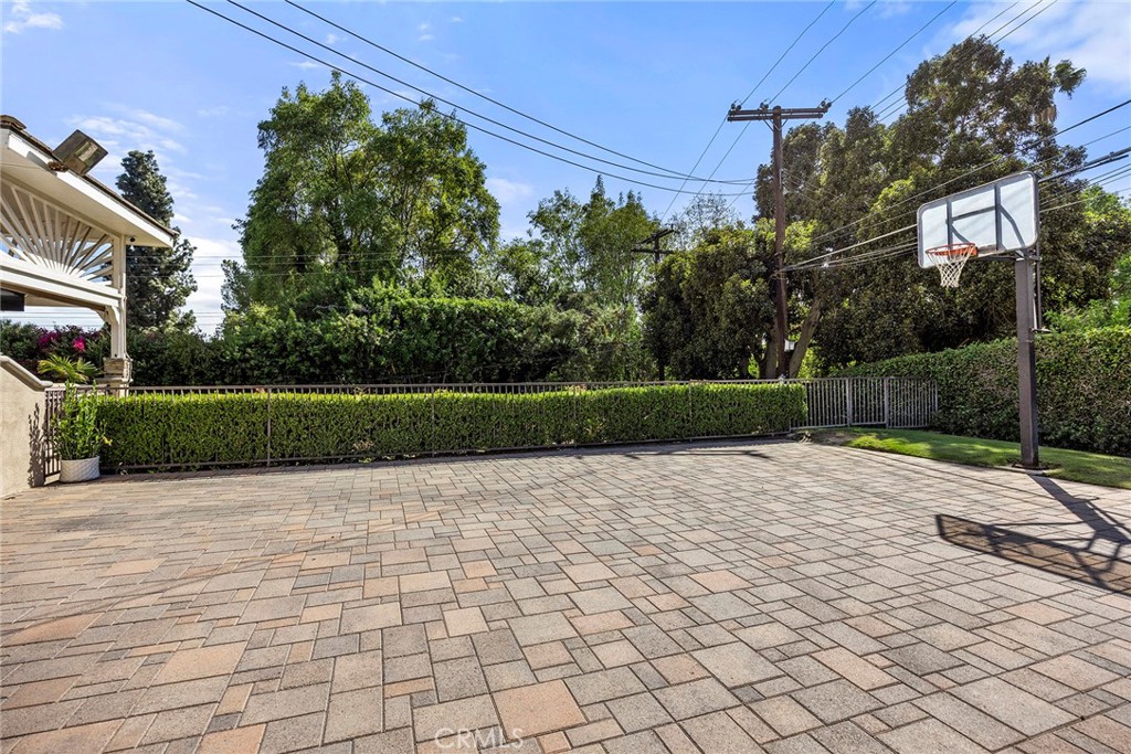 Expansive paved sport court provides additional space for basketball, recreation and outdoor fun. - 2100 Yucca Avenue, Fullerton CA 92835 - photo 50