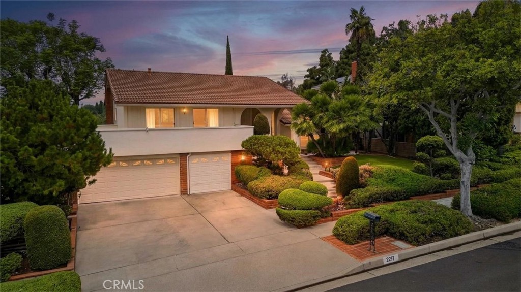 Photo enhanced to twilight for marketing purposes. - 2217 Serrano Place, Fullerton CA 92833 - photo 1