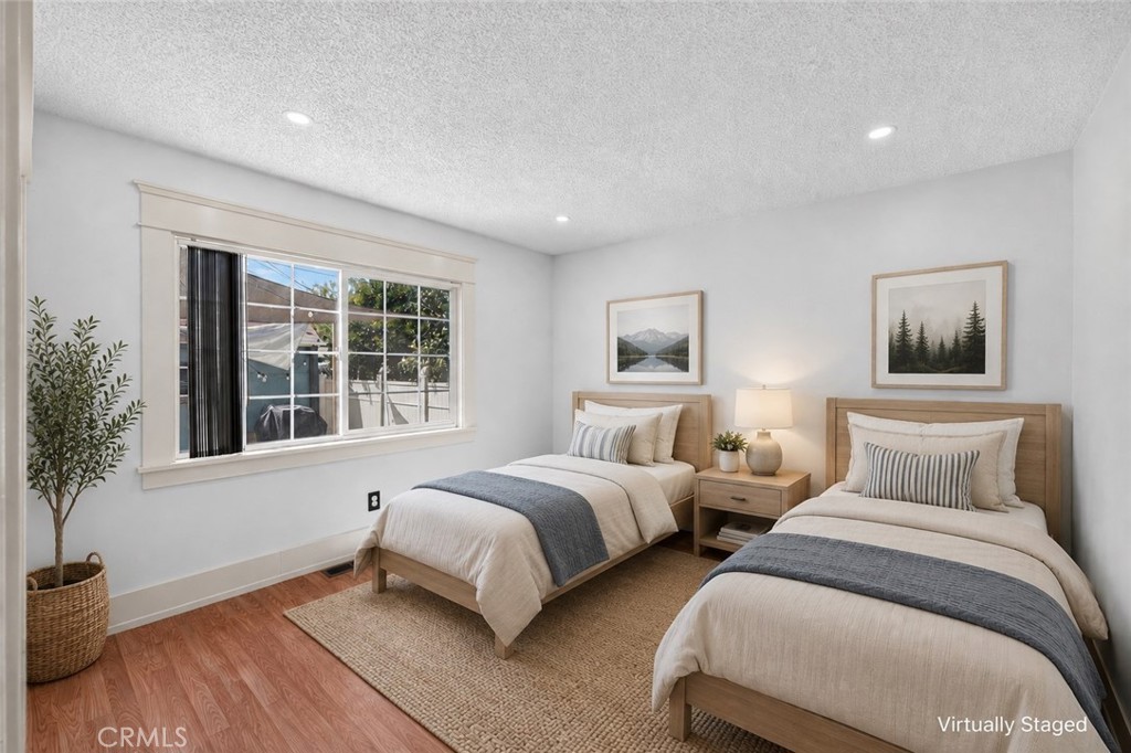 Bedroom #2; Disclaimer: This room has been virtually staged - 2700 W Olive Avenue, Fullerton CA 92833 - photo 15