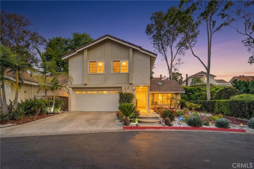 Photo enhanced to twilight for marketing purposes. - 2709 Baycrest Place, Fullerton CA 92833 - photo 1