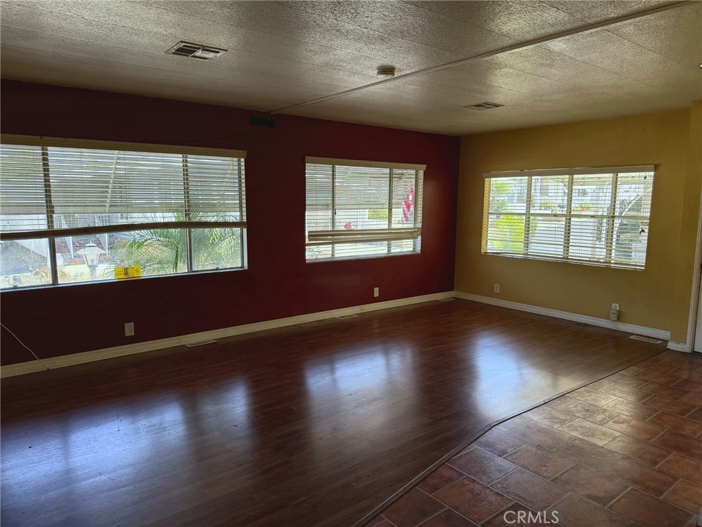 Spacious living room with abundant natural light - 2851 Rolling Hills 187, Fullerton CA 92835 - photo 2