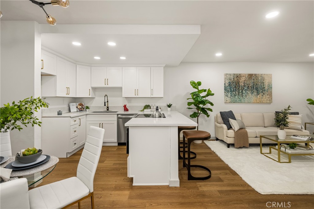 Open Concept Kitchen with Built-In Top Loading Microwave - 3010 Associated Road 122, Fullerton CA 92835 - photo 1