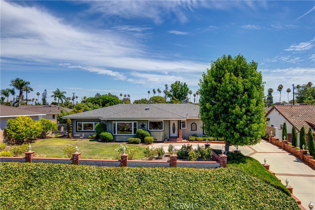 House nestled above the street - 344 Las Riendas, Fullerton CA 92835 - photo 1
