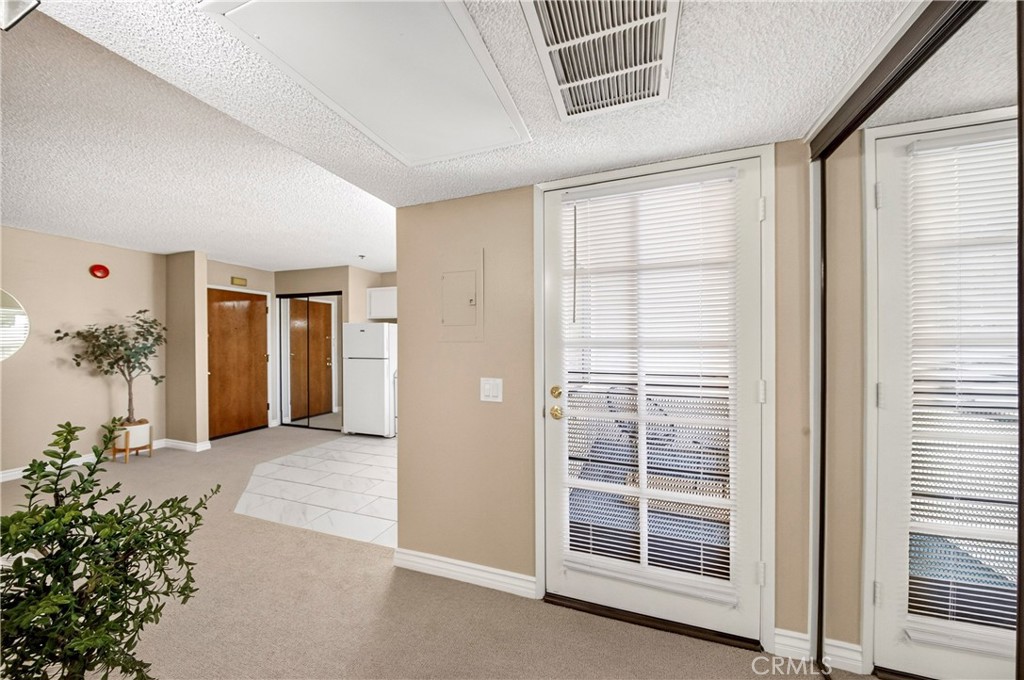 Kitchen and Balcony - 351 N Ford Avenue 326, Fullerton CA 92832 - photo 12