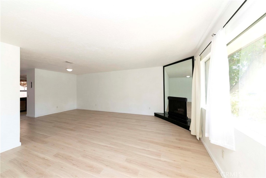 Living Room with fireplace - 3733 N Harbor 53, Fullerton CA 92835 - photo 2