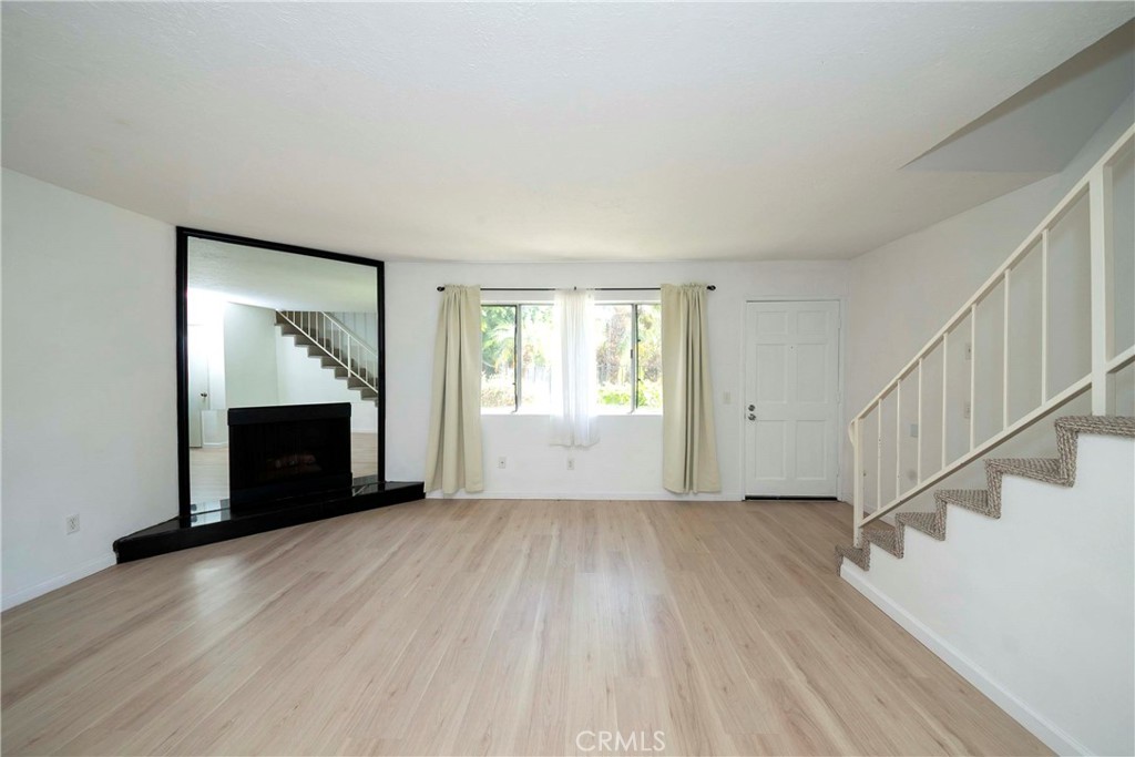 New Laminate floor on 1st Floor - 3733 N Harbor 53, Fullerton CA 92835 - photo 3