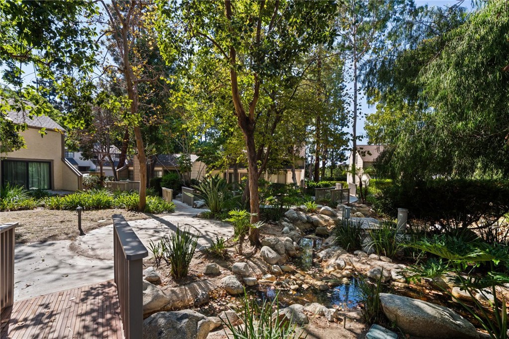 The Community has peaceful Streams throughout, enjoy the sounds of running water - 512 Quiet Brook Circle 188, Fullerton CA 92831 - photo 32