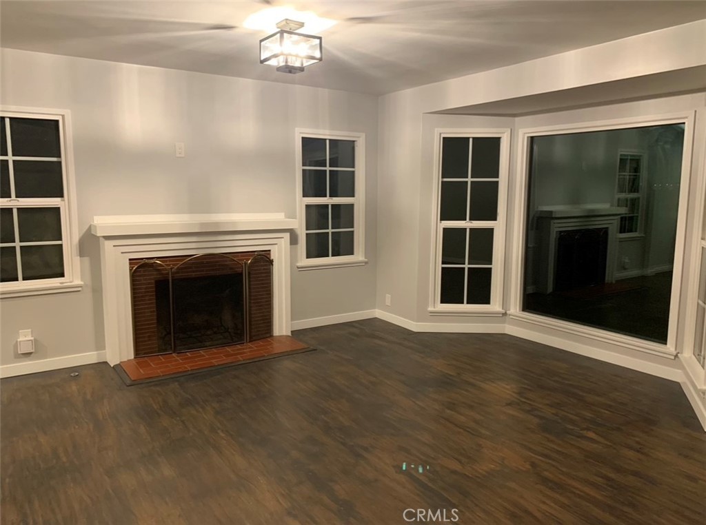 Hardwood Floors, Fireplace, and Large Windows. - 608 Drake, Fullerton CA 92832 - photo 3