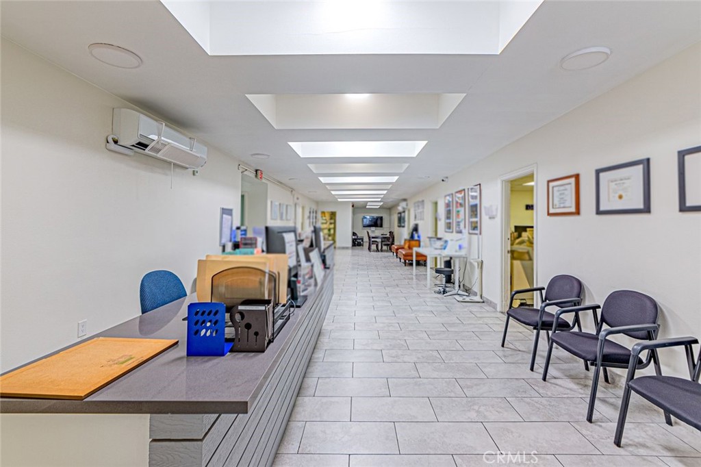 Reception hallway with skylights - 626 W Commonwealth Avenue, Fullerton CA 92832 - photo 9