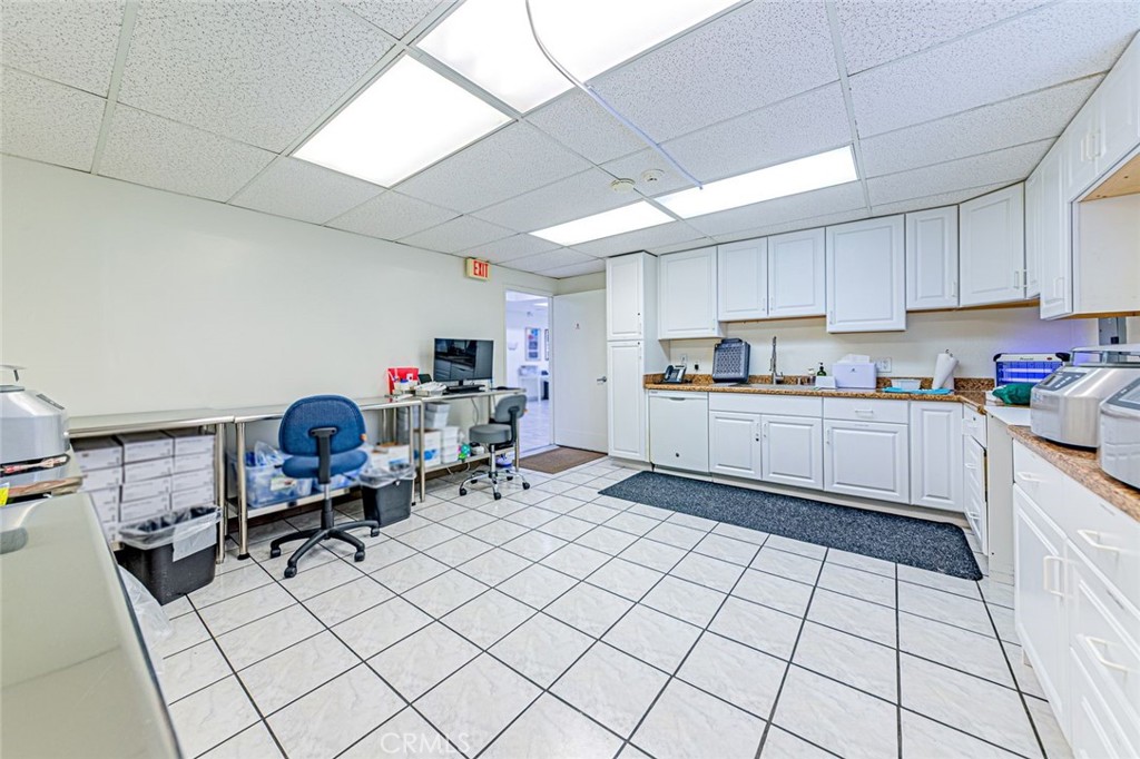 Lab / sterilization room with cabinetry - 626 W Commonwealth Avenue, Fullerton CA 92832 - photo 15