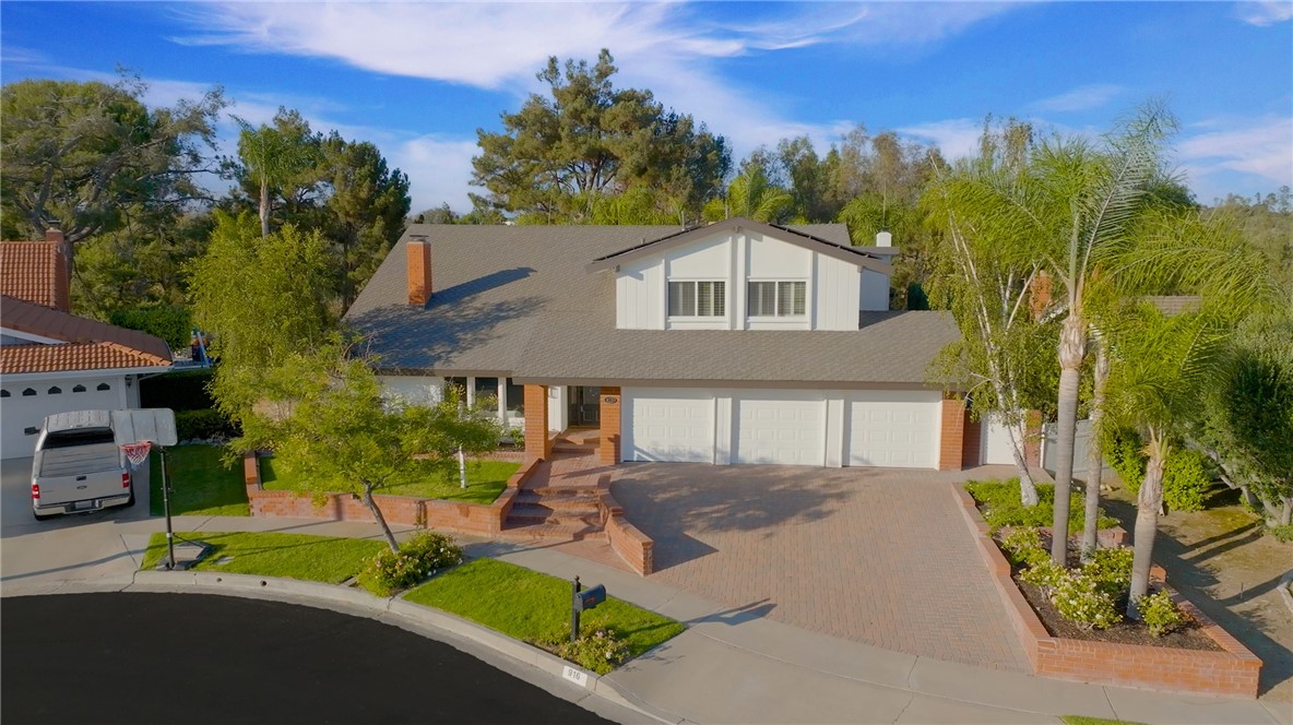 Welcome to your new home, nestled in a peaceful cul-de-sac in a friendly neighborhood. Enjoy the perfect blend of comfor - 916 N Malden Avenue, Fullerton CA 92832 - photo 1