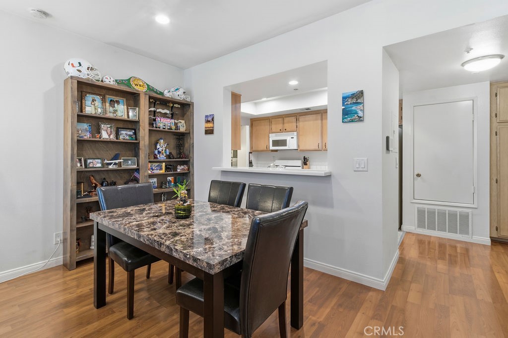 Spacious dining table area - 10361 Garden Grove Blvd 12, Garden Grove CA 92843 - photo 3