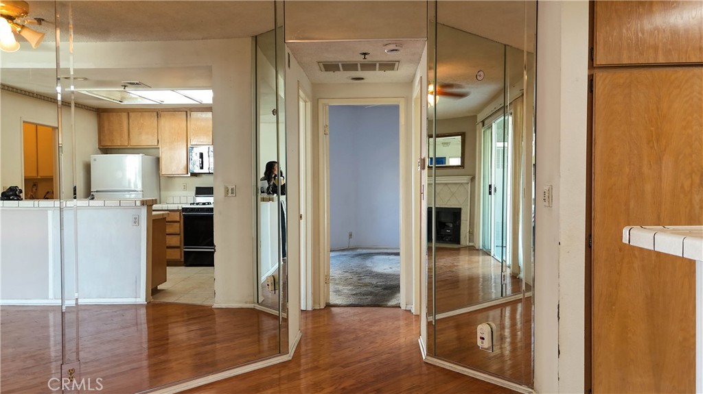 Living Room/Entry to bedrooms - 10371 Garden Grove Blvd 8, Garden Grove CA 92843 - photo 9