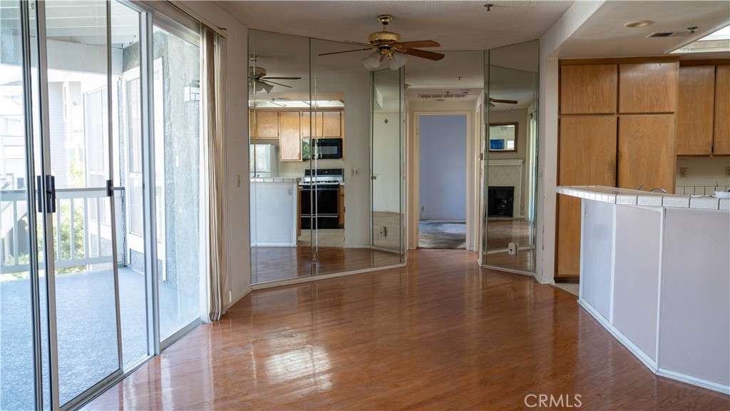 Living Room/Kitchen View - 10371 Garden Grove Blvd 8, Garden Grove CA 92843 - photo 10