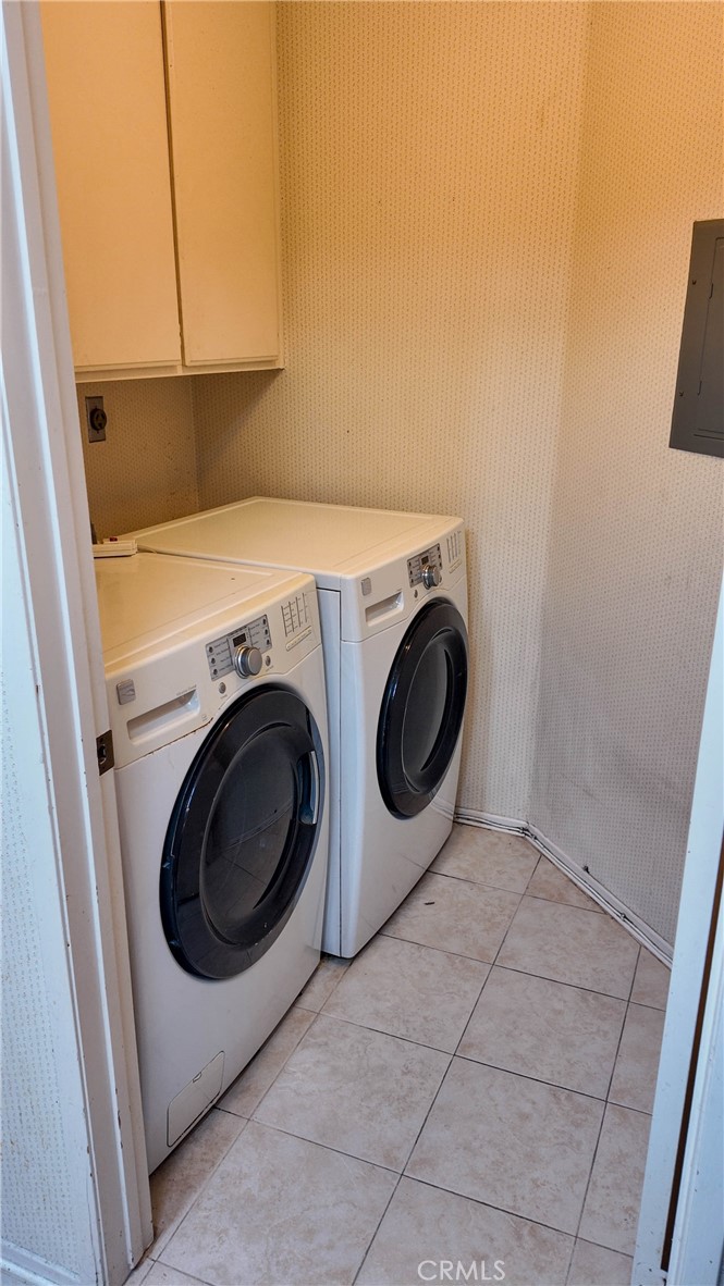 Laundry Room off of the kitchen - 10371 Garden Grove Blvd 8, Garden Grove CA 92843 - photo 18