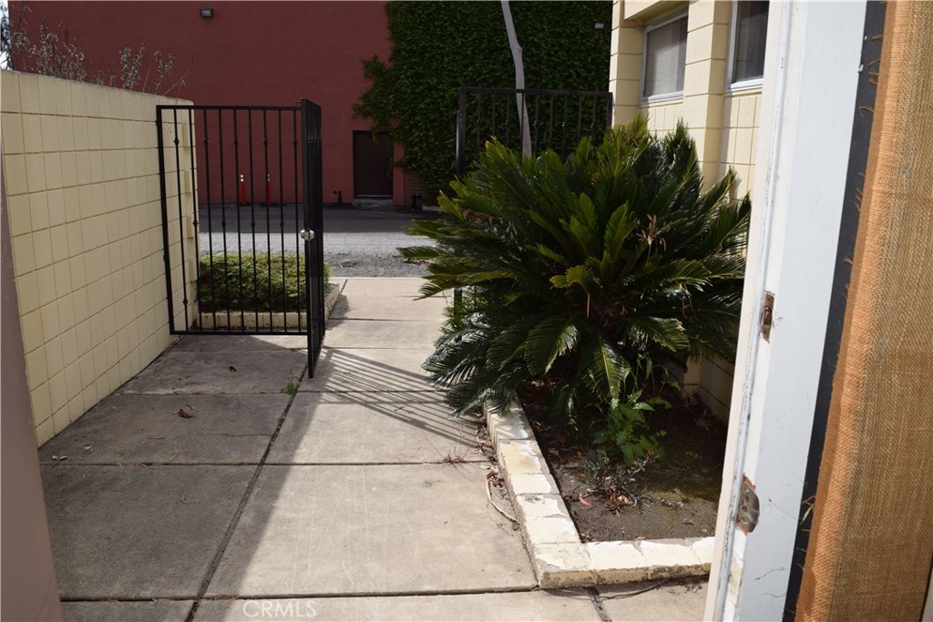 Entry Looking From Front Door to Parking Lot. - 11035 Acacia Parkway 11035, Garden Grove CA 92840 - photo 2