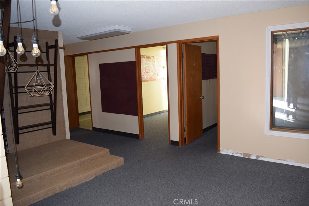 From entry to hallway & "exam" rooms. - 11035 Acacia Parkway 11035, Garden Grove CA 92840 - photo 3